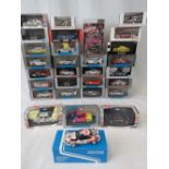 Over 20 die-cast model racing cars all with original packaging or presentation cases,