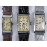 Three vintage 30's gents Swiss made "Tank" watches, Cyma, Roamer and Rotary.