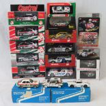 16 die-cast model racing cars, all with original packaging or presentation cases,