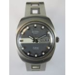 A 1970's Gents Rotary 21 jewel automatic steel cased day/date watch upon a rigid steel sports strap.