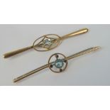 Two 9ct gold bar brooches; one with round aquamarine and four small round cut sapphires,