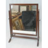 A 19th century oak framed square shaped toilet mirror raised over H shaped base, 41cm wide.