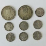 A Victorian Indian one rupee piece dated 1862, a George V Indian one rupee piece dated 1913,