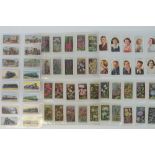 An album containing a large collection of mainly Wills cigarette cards,