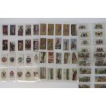 An album containing a large collection of mainly Wills cigarette cards, approx 400 including; dogs,