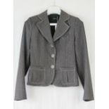 Maeva; a ladies two piece suit comprising jacket and 3/4 length trousers,