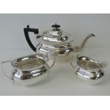 A silver plated tea service comprising teapot, jug and sugar bowl,