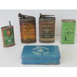 A quantity of vintage motoring and other oil cans together with a vintage Motoring First Aid tin.