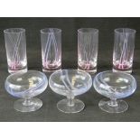 Caithness glass; three champagne coupes or saucers with pink and blue striped design,