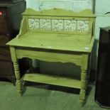 A Victorian pine wash stand with five inset Mintons' tiles to the splash back,