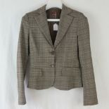 Revenge; a ladies two piece suit comprising jacket and 3/4 length trousers,