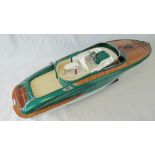 A finely detailed handmade contemporary 1/10th scale static model; green Rivarama motor launch,