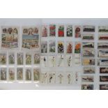 An album containing a large collection of mainly Wills cigarette cards,