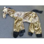 A contemporary hand made single person pantomime horse complete with head hooves and tail.