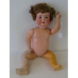 A Continental bisque headed doll, handpainted face with sleepy eyes and open mouth,