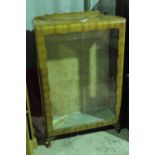 An Art Deco sliding door display cabinet,