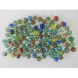 Approx 100 vintage glass assorted 'cats eye' marbles.