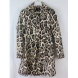 Karen Millen; a leopard print 100% cotton coat, each button stamped Karen Millen,