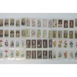 An album containing a large collection of mainly Wills cigarette cards, approx 400 including; roses,