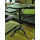 A 19th century circular wine table raised over tripod base, 45cm dia,