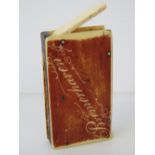 A vintage German vesta case, made from bone with stained front and back, marked Bremerhaven,