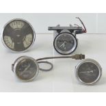 A vintage Smiths triple dashboard gauge being amperes, oil and petrol.