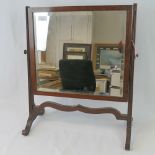 A 19th century mahogany beveled edge square shaped toilet mirror, 50cm wide.