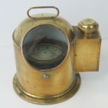 An unusual vintage brass gimble mounted ships compass as made by Smiths of Southampton,
