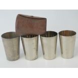 A set of four graduated silver plated hunting cups,