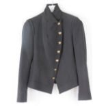 Maeva; a ladies jacket with enamelled coat of arms style buttons,