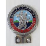 A c1950s vintage 'Behold St Christopher And Go Your Way In Safety' enamel car badge.