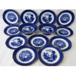 A quantity of eleven Victorian blue and white scenic part gilded plates, with two matching tazzas.