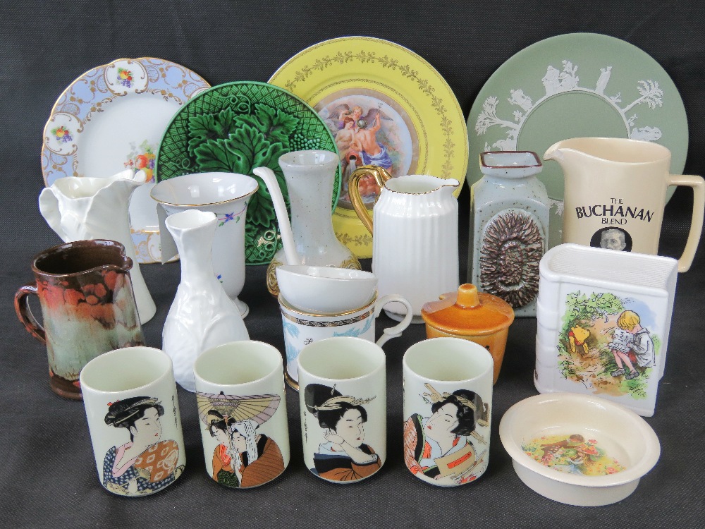 A quantity of assorted ceramicware including plates, jugs, vases, etc.