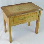 A Continental style painted lidded child's desk, 46cm wide.