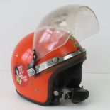 A vintage racing helmet complete with visor,