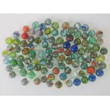 Approx 100 vintage glass assorted 'cats eye' marbles.