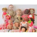 A quantity of Edwardian and later dolls and dolls clothing, some 1960's,