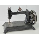 A late 19th century London made sewing machine stamped Harris upon and probably being the Harris