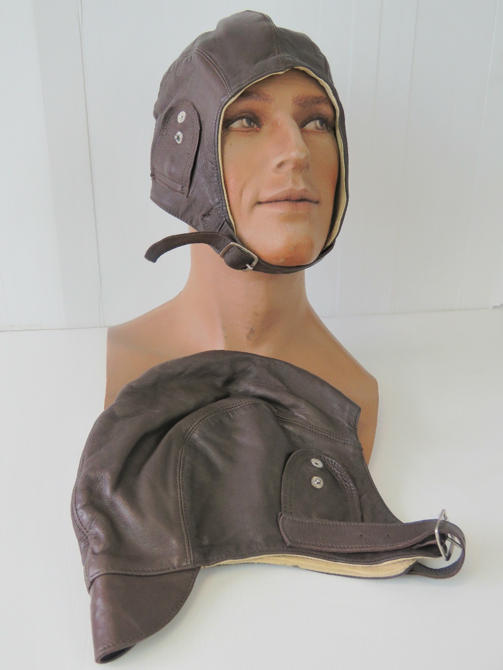 A matched pair of pre-war pattern lady/gents motoring/aviation helmets;