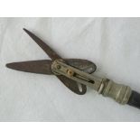 A vintage Dubois flower picker with cane shaft,