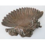 A delightful vintage cast bronze ashtray c1930s in the form of a recumbent female with splayed