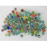 Approx 100 vintage glass assorted 'cats eye' marbles.