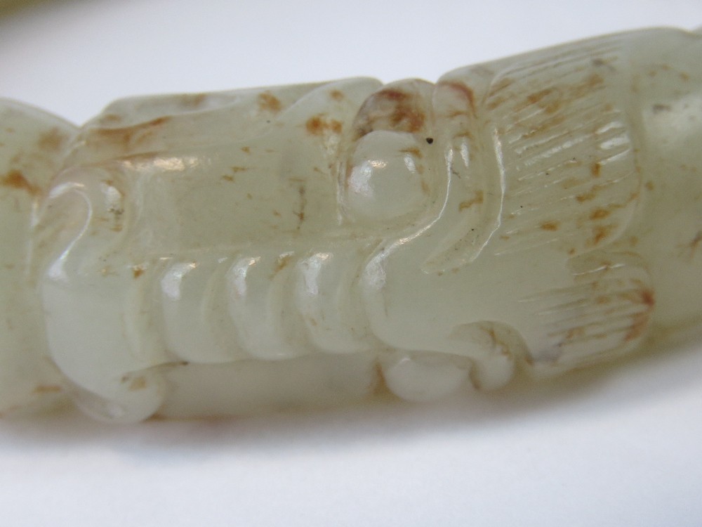 A Chinese carved celadon jade bangle wit - Image 3 of 3
