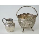 A white metal sweet meats bowl standing