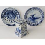 An old Delft pottery pedestal stand, 15cm, a/f, a Delft pottery plaque dated 1913, 26cm,