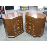 A pair of octagonal bedside tables, each