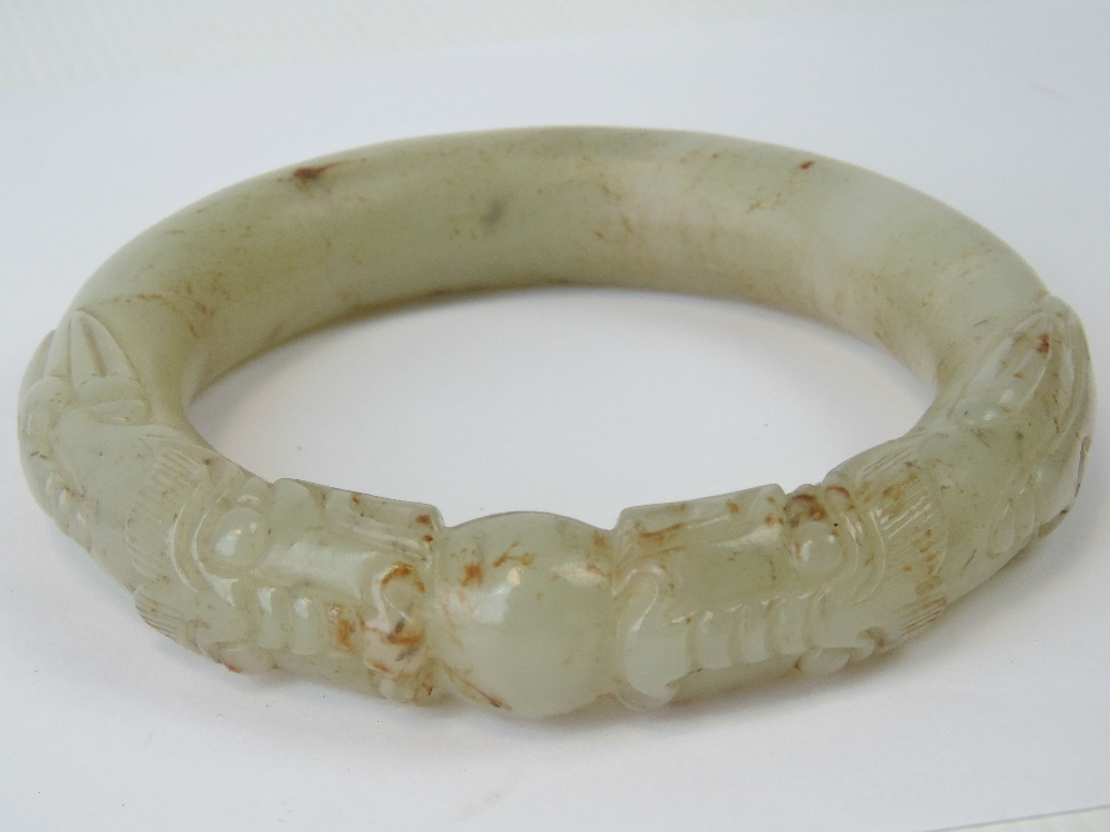 A Chinese carved celadon jade bangle wit - Image 2 of 3