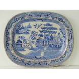 A large and impressive blue and white transfer-printed 'Willow pattern' meat plate,