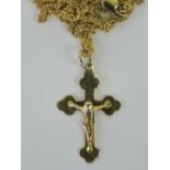 A 9ct gold crucifix, hallmarked 375, 0.9