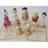 A Beswick complete set of seven Flintstones figures, limited edition No 84 of 2000,